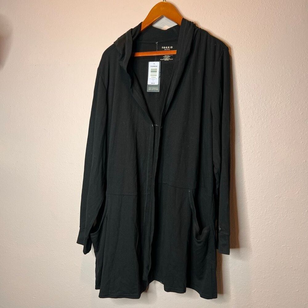 Torrid Active brand hoodie is a versatile black featuring pockets and a relaxed